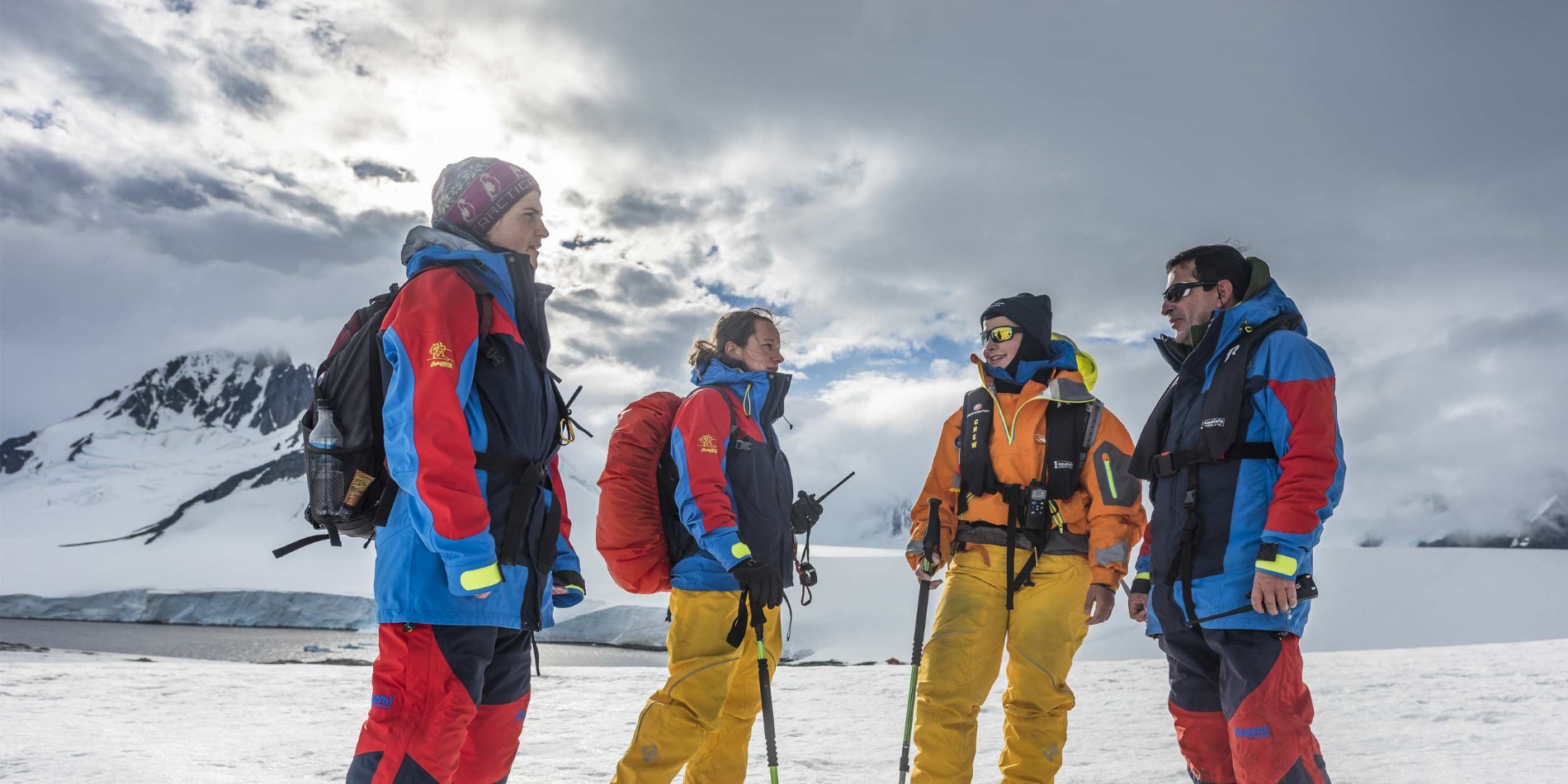 Expedition Team planning a hike in Damoy Point, Antarctica