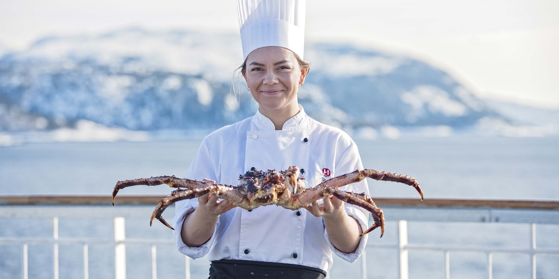 One of our chefs with the majestic king crab on deck